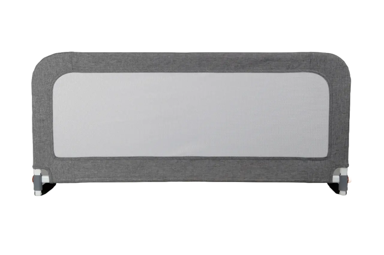 Folded SafetyThings bed guard standing against a wall